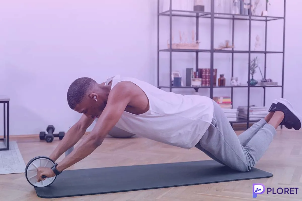 man doing ab roller exercise for preventive healthcare fitness